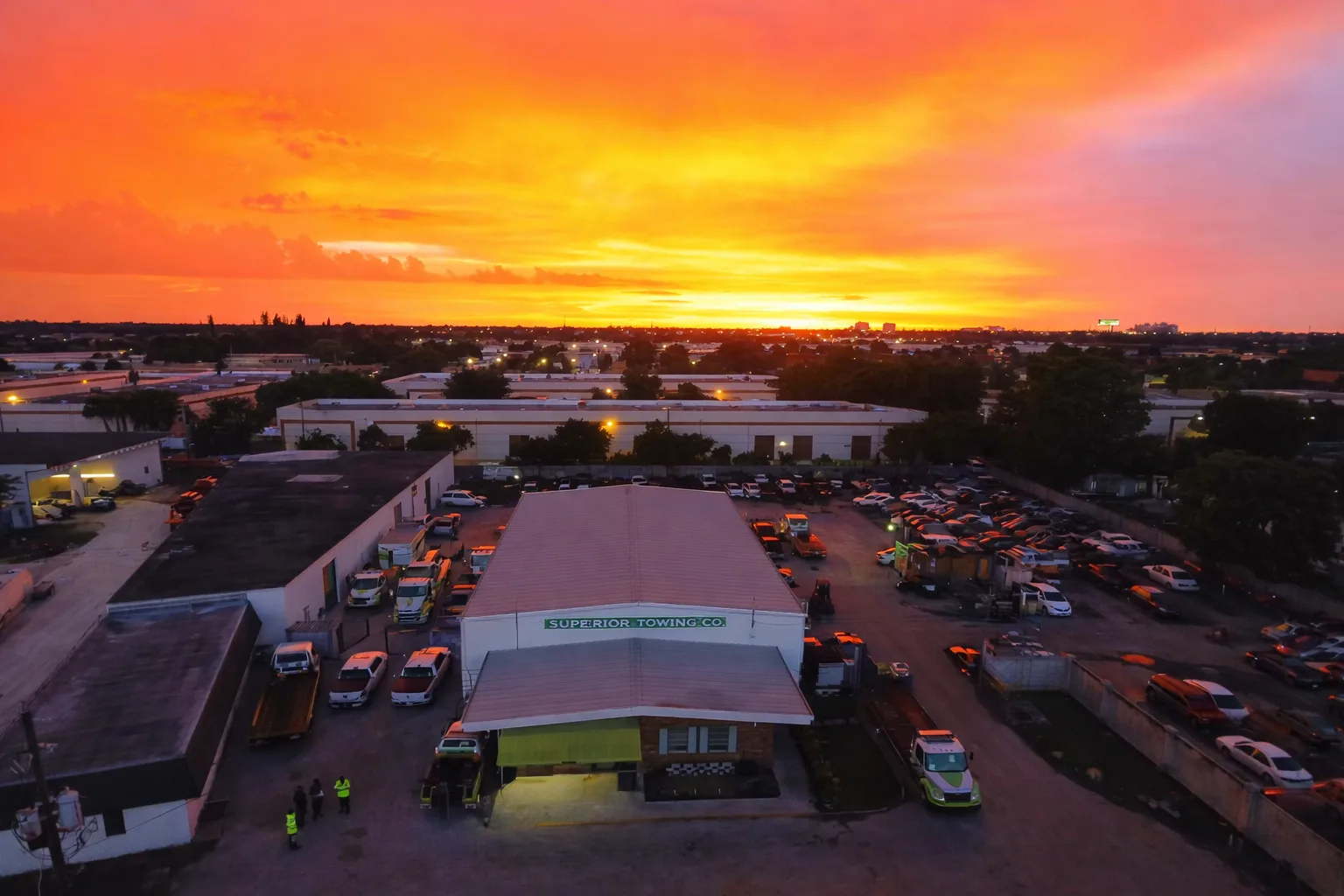 Superior Towing headquarters and fleet yard in Davie FL photographed at sunset